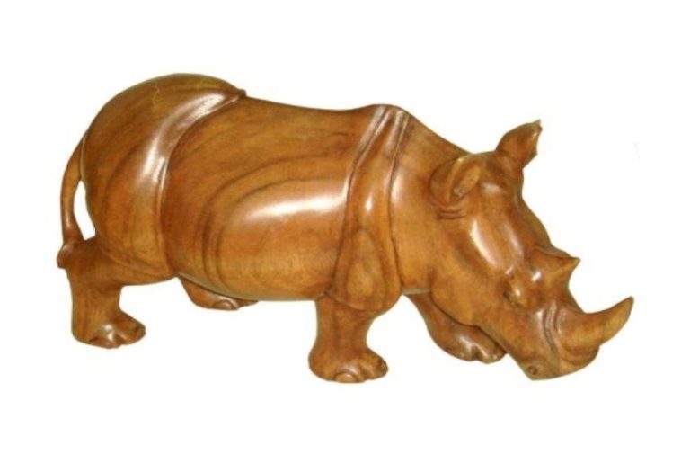 Handgefertigte afrikanische Nashornfigur aus Massivholz, traditionelle Deko im Afrika  Shop kaufen
